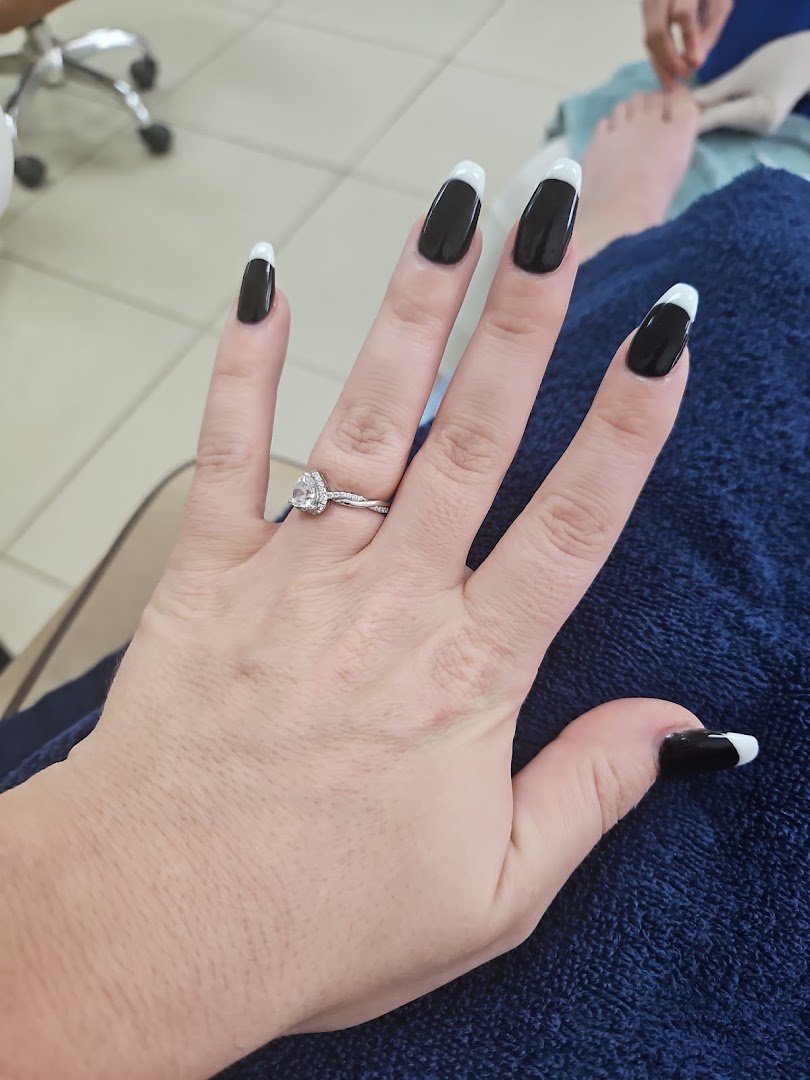Manicure station with polish bottles and tools.